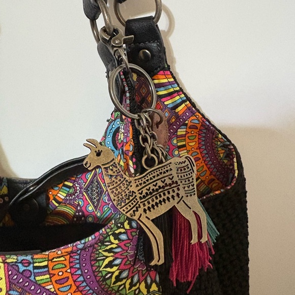 Sakroots bag, characterized by its distinctive bohemian and colorful design. - Picture 3 of 12